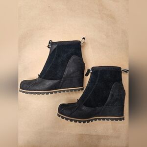 UGG Excellent condition Reggie waterproof leather wedge boots. Size 8